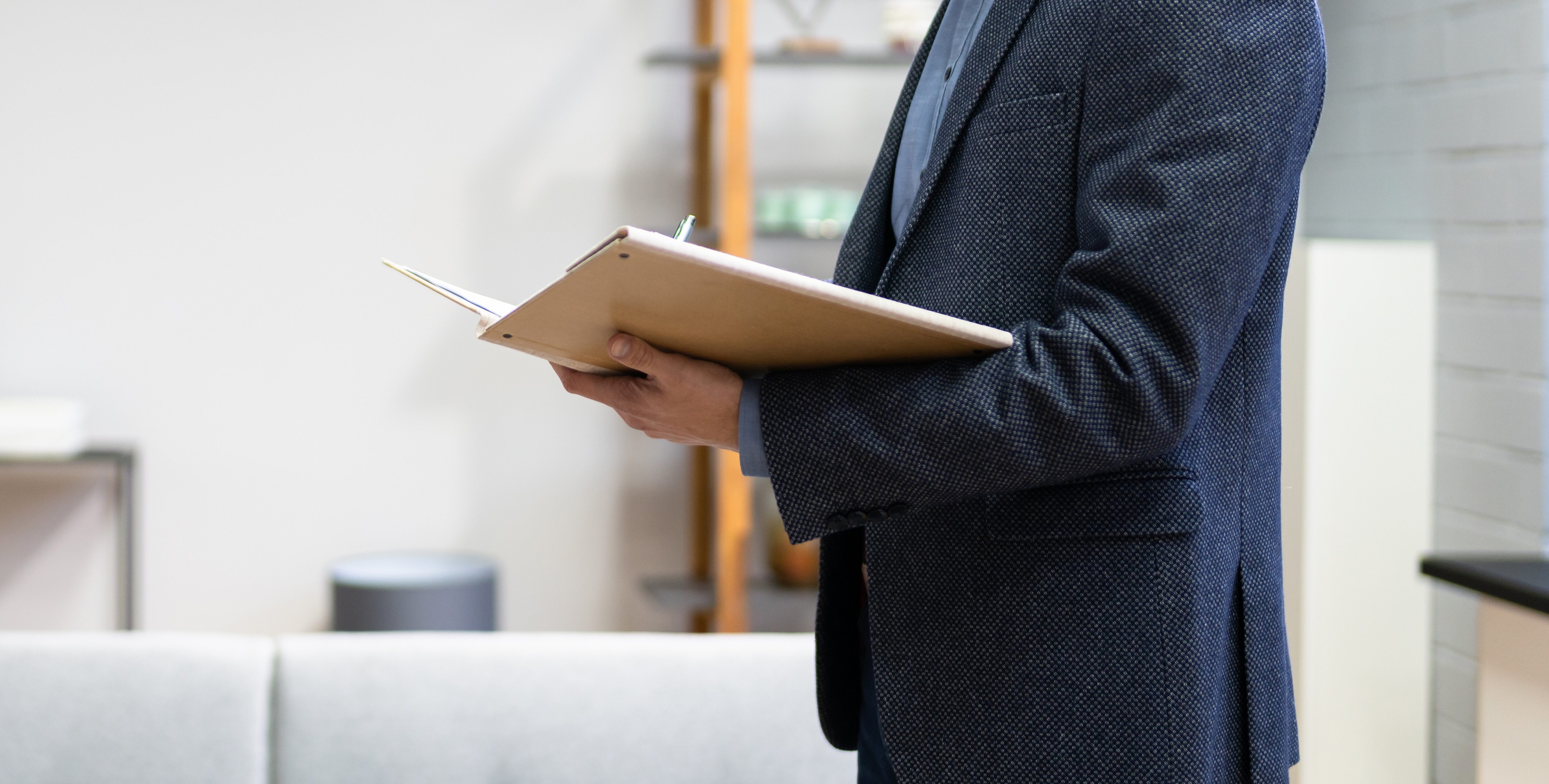 property inspector carrying out a rental property inventory report.