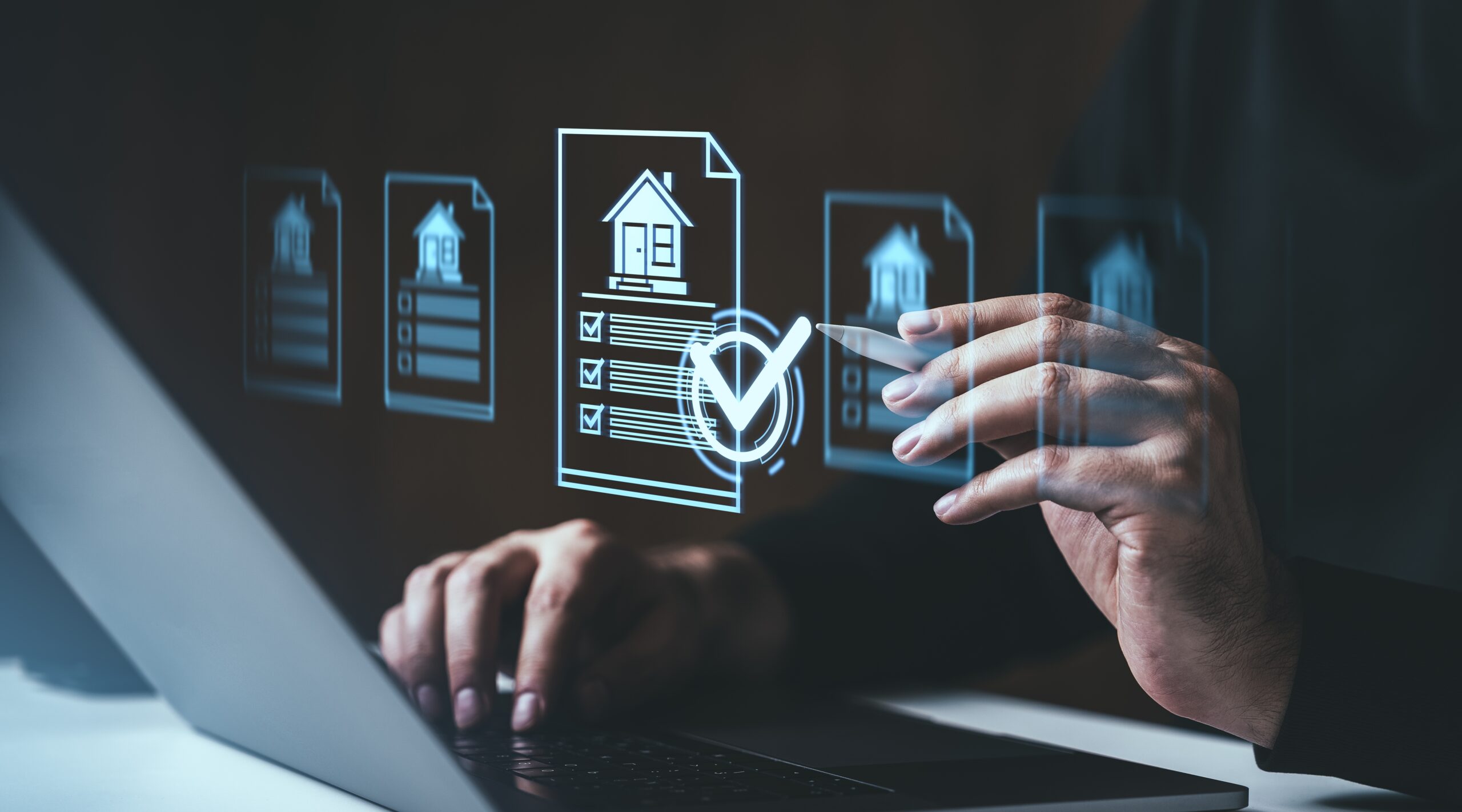 A person using a laptop with digital property management icons floating in the air, representing document checklists and compliance verification.