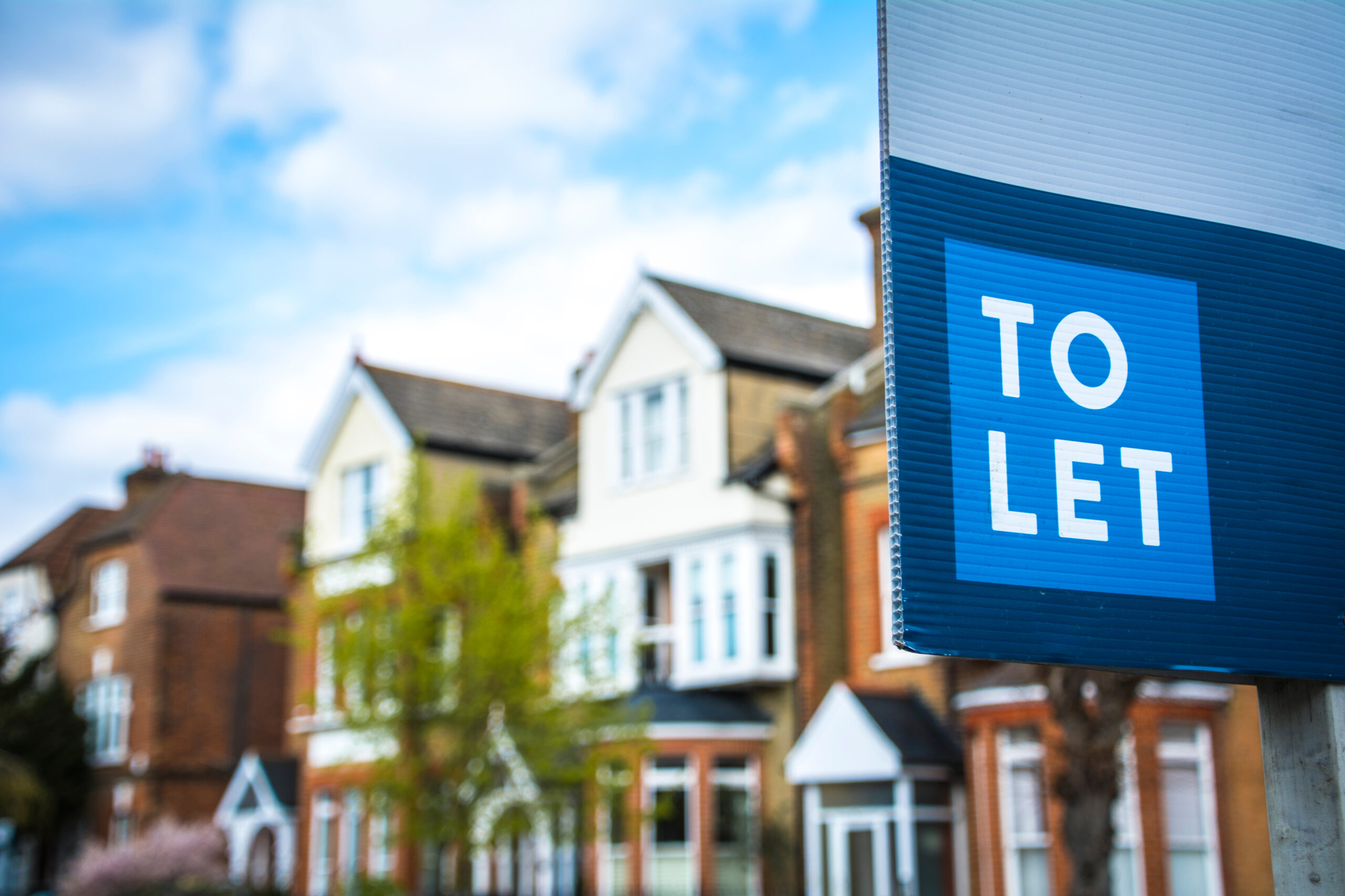 To Let sign outside UK homes, representing rental properties managed with property compliance software.